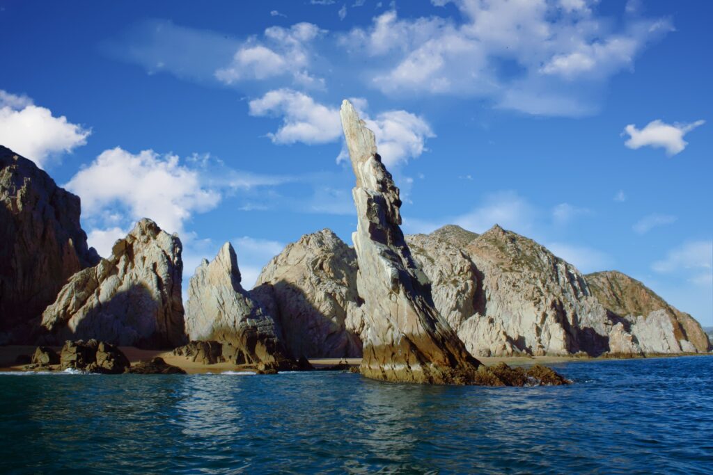Glass Bottom Boat Stunning rock formations and ocean view in Cabo San Lucas, Mexico.